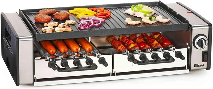 Fantástico grill multifunción (grill y en su reverso placa de cocción). Dispone de un sistema único, patentado para cocinar deliciosas brochetas y un sistema rotatorio para preparar hotdogs.