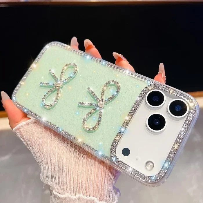 Funda a prueba de golpes con lazo doble y purpurina de diamante para iPhone 17 Pro Max (verde claro)