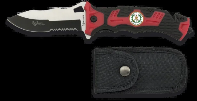 Navaja Martinez Albainox Negra/Roja Sin Chapa, mango ABS-goma, hoja de acero inoxidable de 9.1 cm, sistema Fos. Incluye clip, punta rompevidrio, cutter, cinturón de seguridad y funda de nylon 19893AGR1008