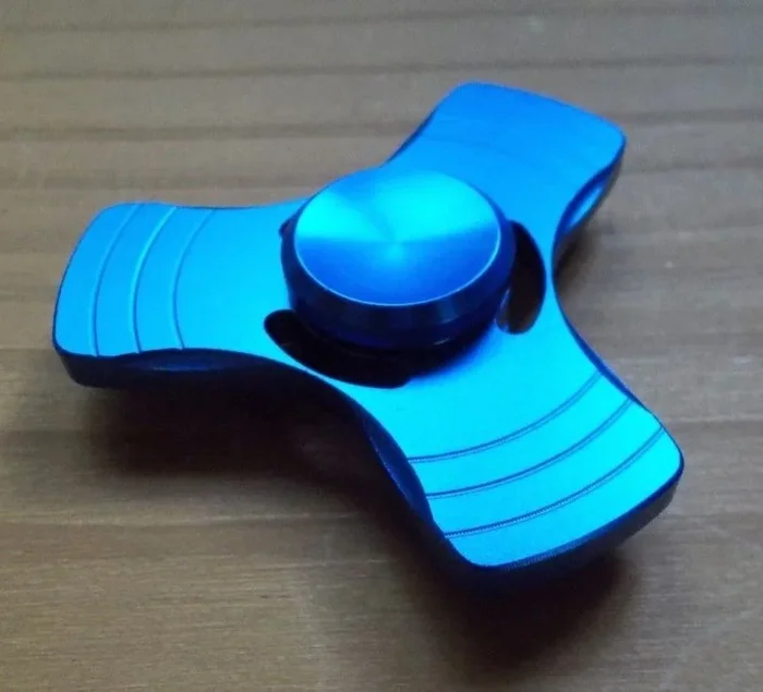 Spinner metalico bronce